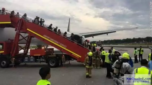 No casualties as Singapore Airlines plane catches fire after emergency landing (photos)